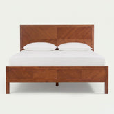 Crafted from premium solid rubberwood, this bed frame is a masterclass in structural integrity. We practice "Material Honesty," eschewing engineered boards for authentic wood that retains its natural resilience and dense composition. Every frame is a unique masterpiece, ensuring lifelong durability.