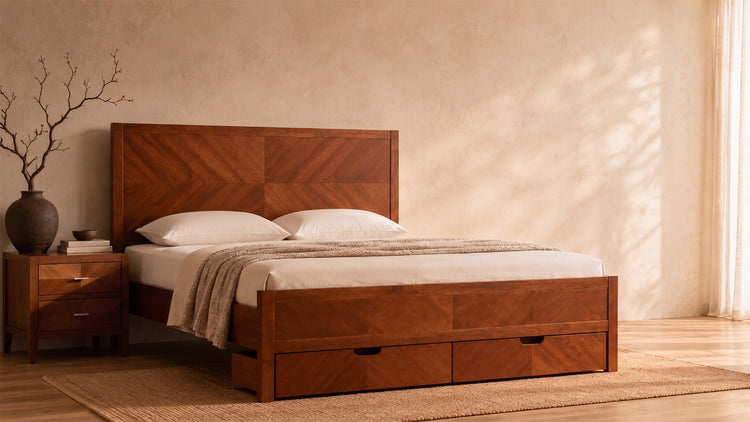 A high-end acacia wood storage bed with a rich geometric wood grain headboard and under-bed drawers, styled in a quiet bedroom with beige linen bedding, textured plaster walls, soft natural morning light, and minimalist earthy decor. The bed is positioned slightly left with clean negative space on the right for branding.