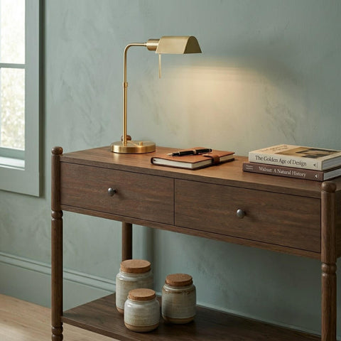 Wing solid wood console table in dark walnut styled in a hallway with artwork and home accessories