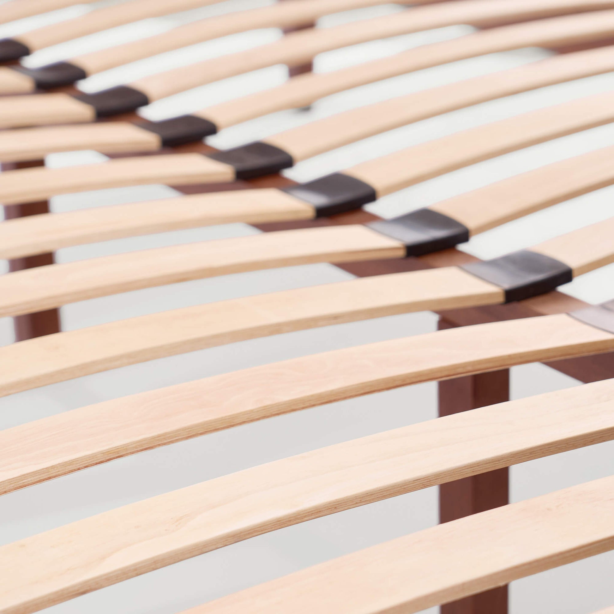 Premium curved wood slats offer adaptive support and superior airflow for your mattress. No box spring is required, maintaining a clean, low-profile look.