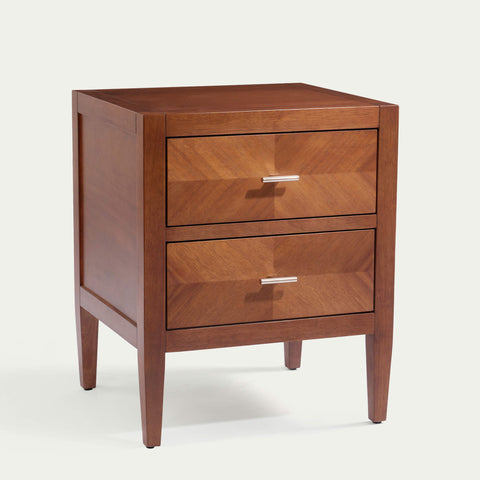 Krevon Wings solid wood nightstand in dark walnut finish styled in a minimalist bedroom setting
