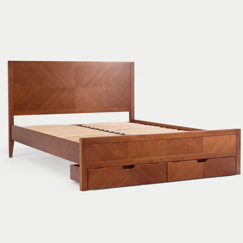 Wooden bed frame with drawers on a white background